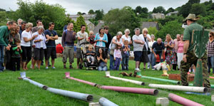 Crowds watching ferret races