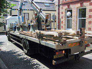 Bells being loaded onto the lorry